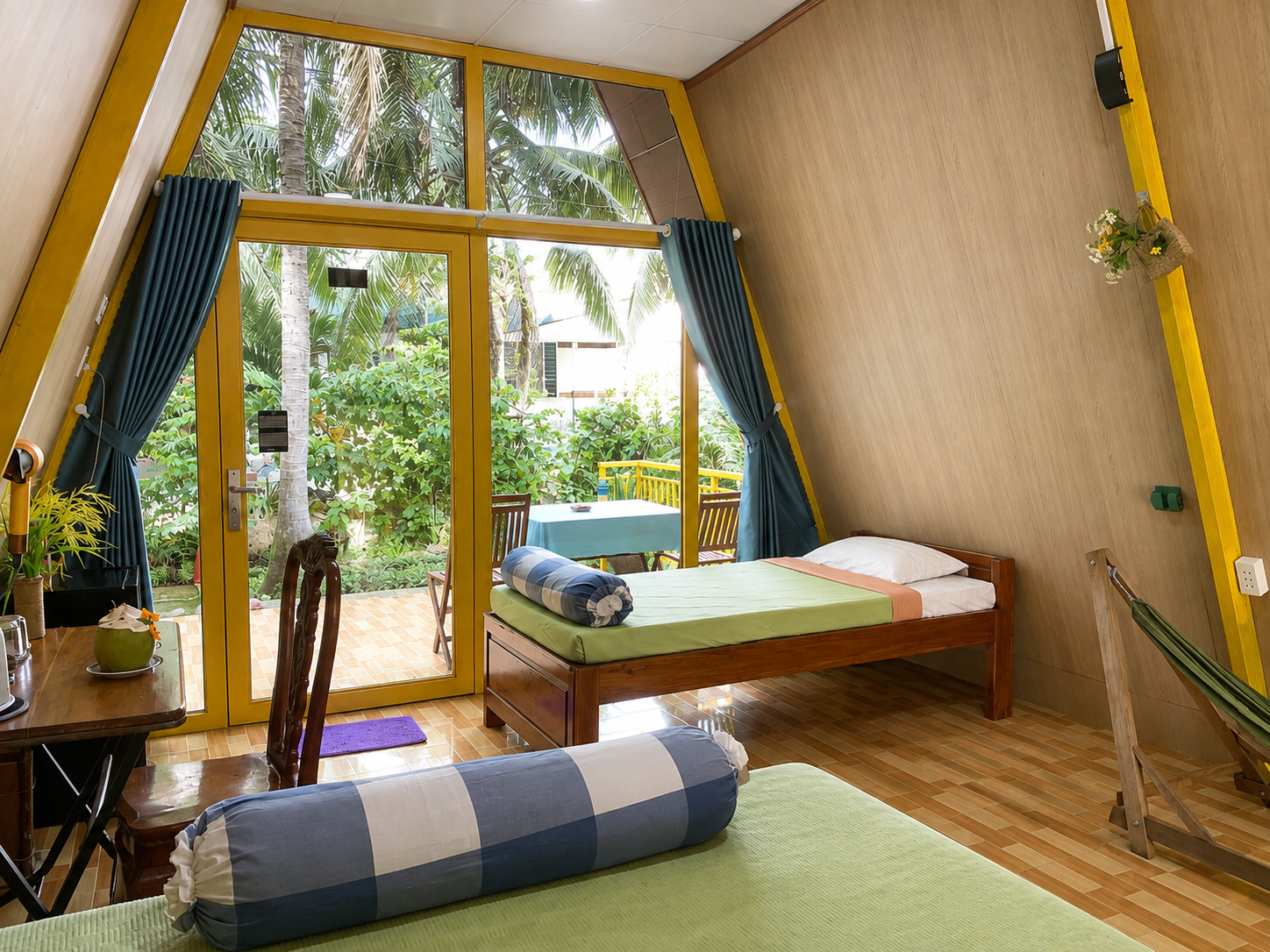 Spacious 50 m² private bungalow with air conditioning in a coconut garden homestay in Ben Tre