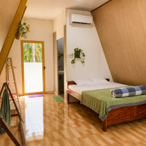 Spacious 50 m² private bungalow with air conditioning in a coconut garden homestay in Ben Tre