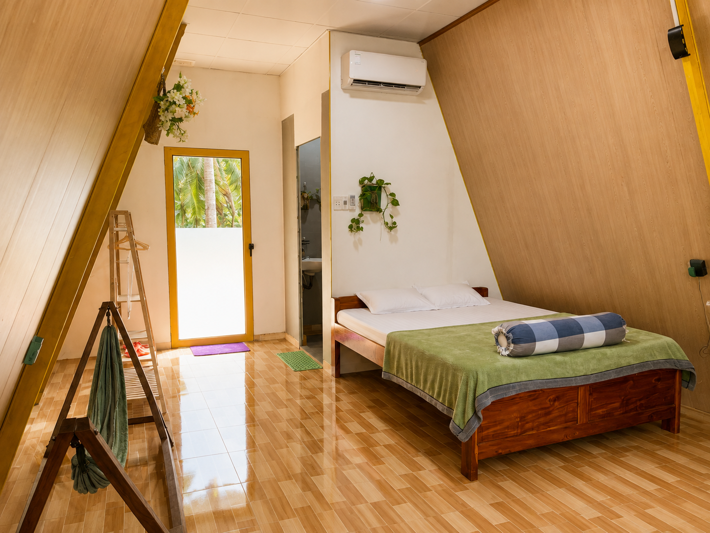 Spacious 50 m² private bungalow with air conditioning in a coconut garden homestay in Ben Tre