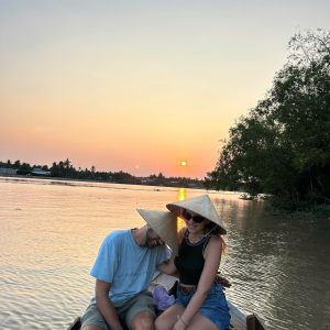 Sunset boat ride on the Mekong River in Ben Tre Vietnam