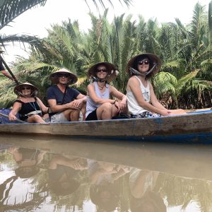 Sunset sampan boat tour through hidden Mekong canals in Ben Tre
